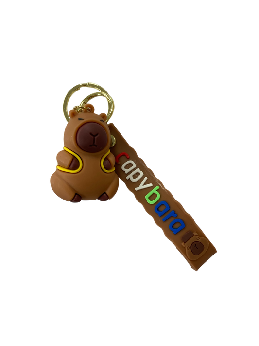 yellow backpack wearing capybara character keychain